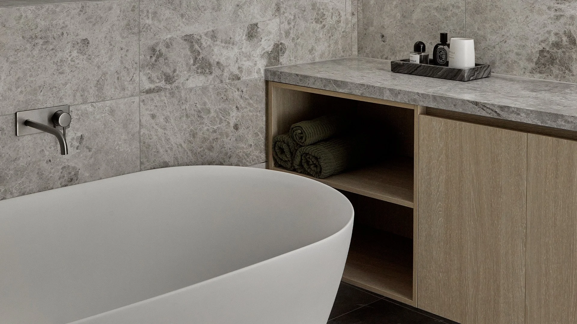 Custom bathroom vanity in stone and timber